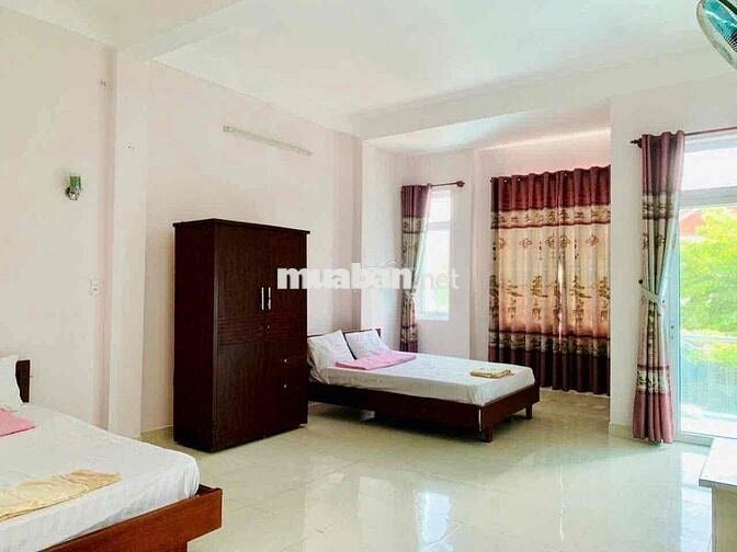 Nhà 3,5 tầng 10Phòng mặt tiền Đinh Công Trứ dòng tiền 45tr/tháng