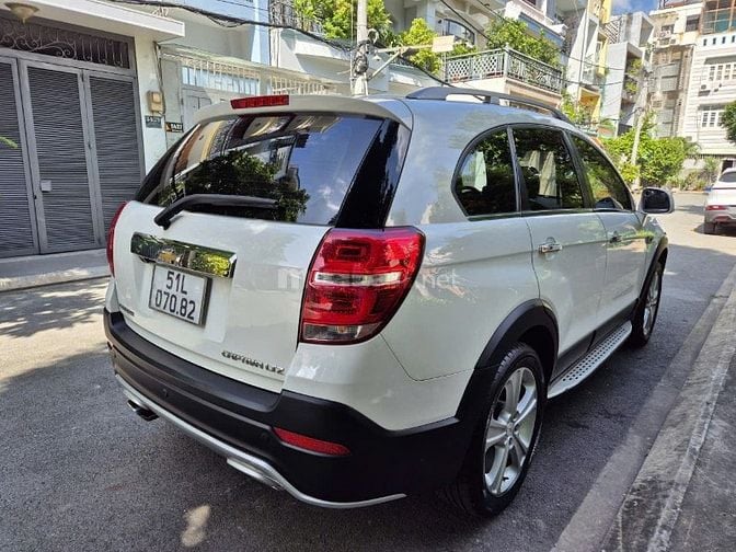 Cần bán Captiva đời 2015 số Auto,màu trắng,gđ sử dụng mới 98%.