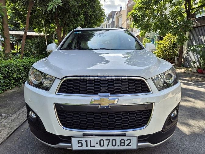 Cần bán Captiva đời 2015 số Auto,màu trắng,gđ sử dụng mới 98%.