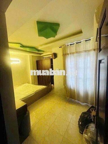 Nhà nở hậu Tô Hiến Thành, Quận 10  (2 lầu, có sân thượng, 4PN, 5WC)