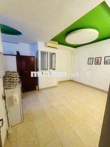 Nhà nở hậu Tô Hiến Thành, Quận 10  (2 lầu, có sân thượng, 4PN, 5WC)