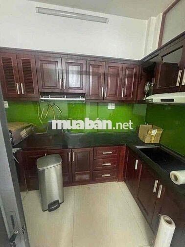 Nhà nở hậu Tô Hiến Thành, Quận 10  (2 lầu, có sân thượng, 4PN, 5WC)