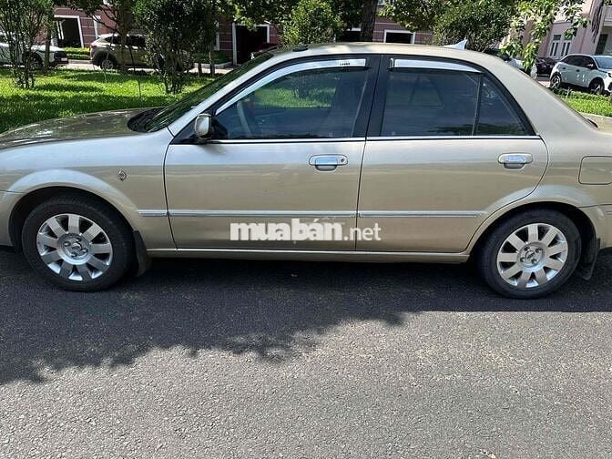 Ford Laser 2004 GHIA 1.8 AT - 158000 km