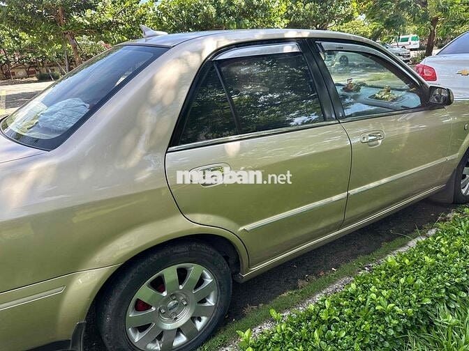 Ford Laser 2004 GHIA 1.8 AT - 158000 km