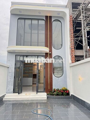 NHÀ LẦU MỚI gần THPT Tân Hiệp Bảo Hành Kết Cấu 10 năm