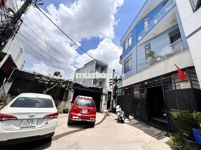 Nhà 3 Tâng HXH sát Tr. Học Đào Sơn Tây Linh Xuan DT60m 4Pn Hoàn Công