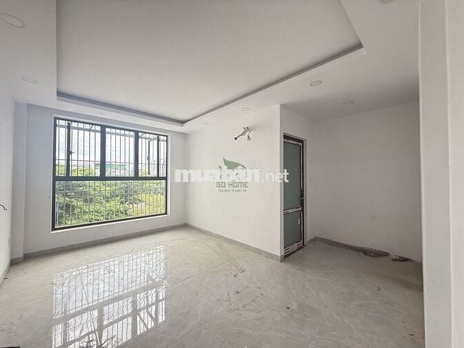 NHÀ  4 TẦNG CÓ THANG MÁY ĐƯỜNG THÍCH QUẢNG ĐỨC GIÁ 42 TRIỆU/THÁNG