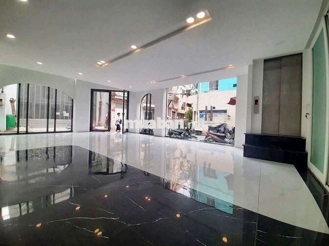 NHÀ 4 TẦNG CÓ THANG MÁY 2 MT LÊ VĂN SỸ