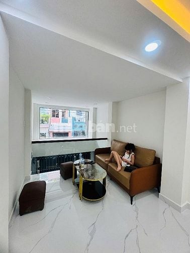 Nhà đẹp 4 tầng MT Nhật Tảo P8 Q10