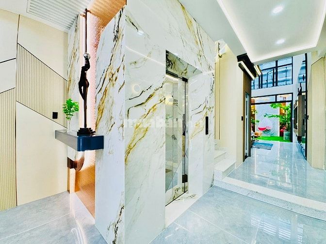 Bán nhà mặt tiền đẹp 5 tầng 549A Tân Sơn P12 Gò Vấp (THANG MÁY 650kg