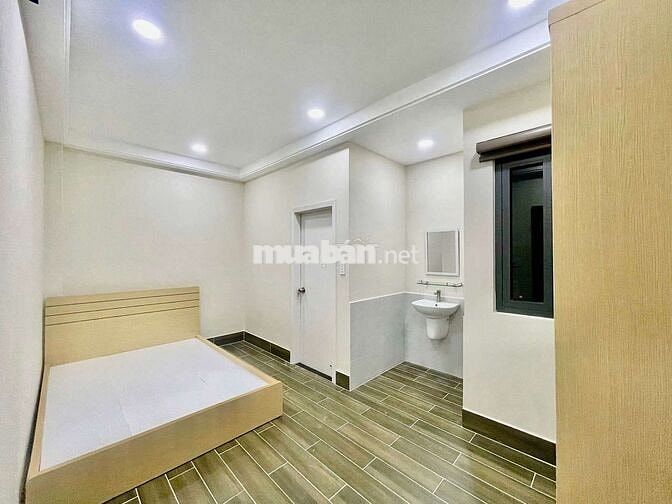 Nhà mới 100% ( 4 x 16 có 3 lầu 5pn 5wc sân thượng)