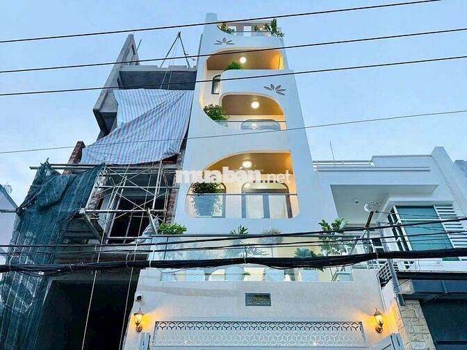 Nhà xe hơi bỏ vô nhà 1/ mặt tiền quang trung sầm uất