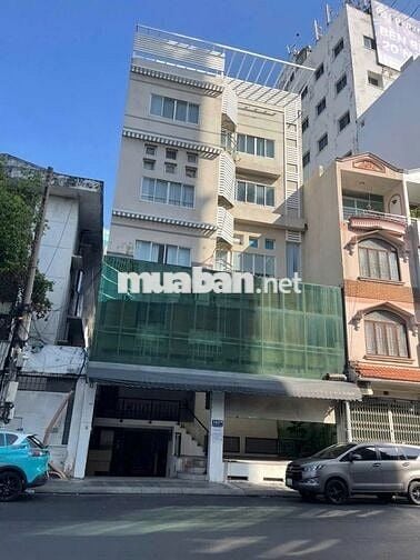 Tòa nhà 2 hầm 6 tầng có thang máy, MT Nguyễn Đình Chính 90tr/tháng