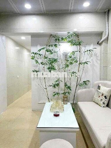 Tập thể 50 m2 sổ đỏ tầng 1 mặt ngõ thông phố Bùi ngọc Dương 5 m ra oto