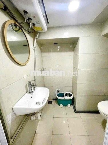 Tập thể 50 m2 sổ đỏ tầng 1 mặt ngõ thông phố Bùi ngọc Dương 5 m ra oto