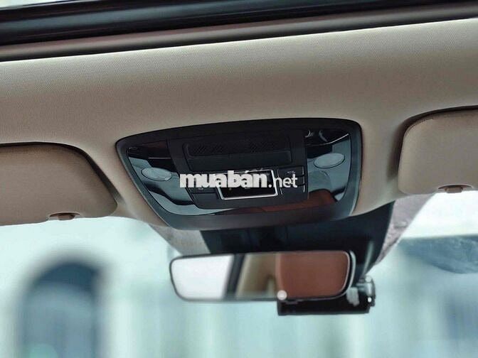 Kia Carnival 2.2D Signature 2023 màu đỏ mận