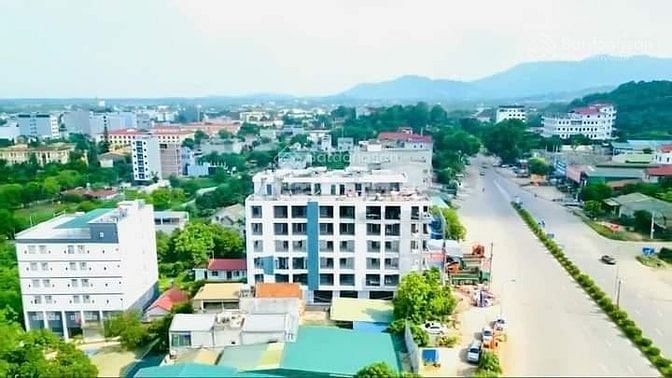 Bán đất DT 200m2, nằm trên trục đường chính 15m, sổ đỏ đầy đủ. 