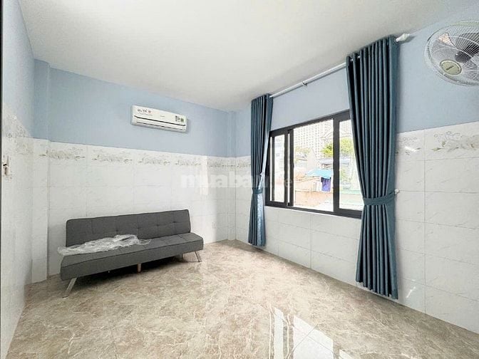 Cho thuê nhà hẻm 7m (XT) Nơ Trang Long, P.13, Q.BTH giá 9tr