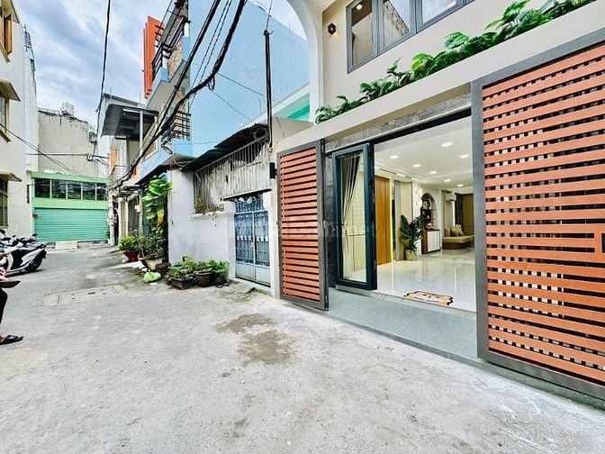 Bán nhà HXH + xây mới + Tặng NTCC trung tâm Gò Vấp