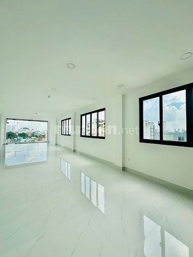 Cho thuê toà nhà mới xây 7 tầng đường Phan Đăng Lưu, P7, Q.PN