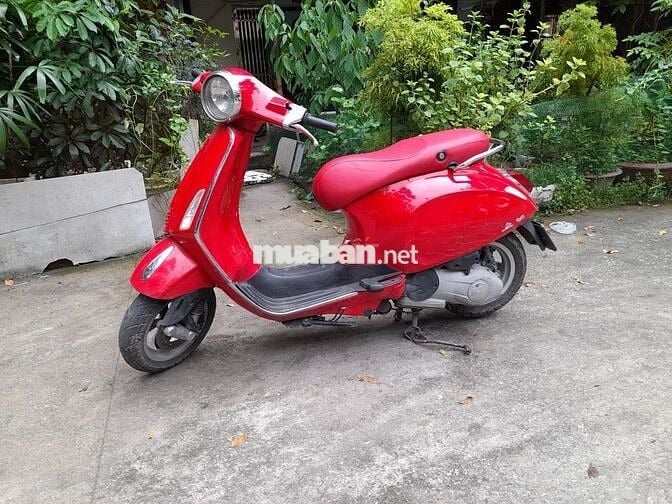 Dư dùng giá đình thành chiếc xe piaggio.primavera1
