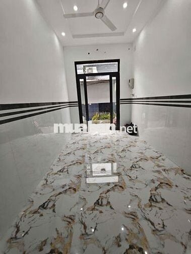 Nhà trệt lầu 4 triêụ mới 100% gần Hồ Bún Xáng