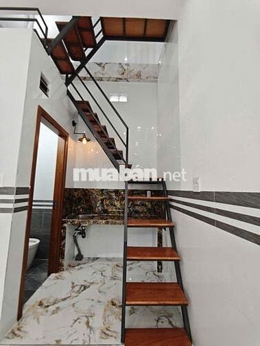 Nhà trệt lầu 4 triêụ mới 100% gần Hồ Bún Xáng