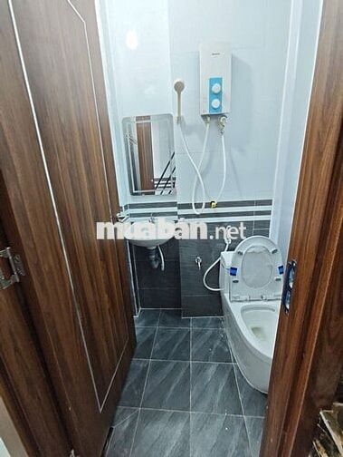 Nhà trệt lầu 4 triêụ mới 100% gần Hồ Bún Xáng