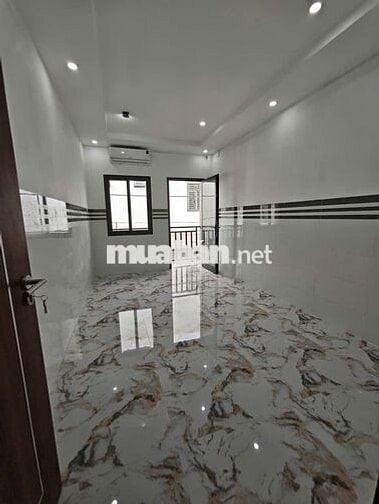 Nhà trệt lầu 4 triêụ mới 100% gần Hồ Bún Xáng