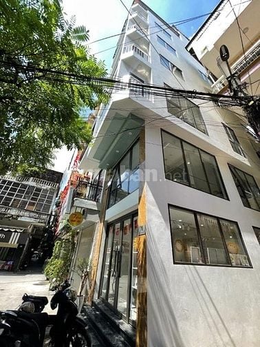 NHÀ LÔ GÓC 7 TẦNG KINH DOANH GIÁ 23,2TỶ.