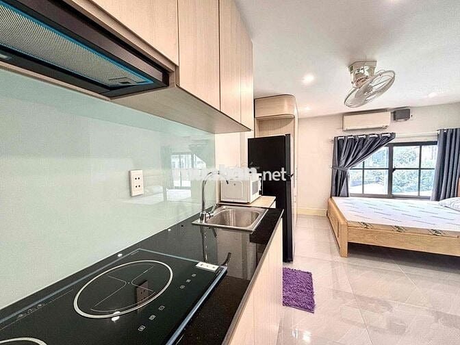 Phòng mới 100%,cửa sổ trời, xa bếp - Nơ Trang Long gần Q1,Q2 5tr5-7tr5
