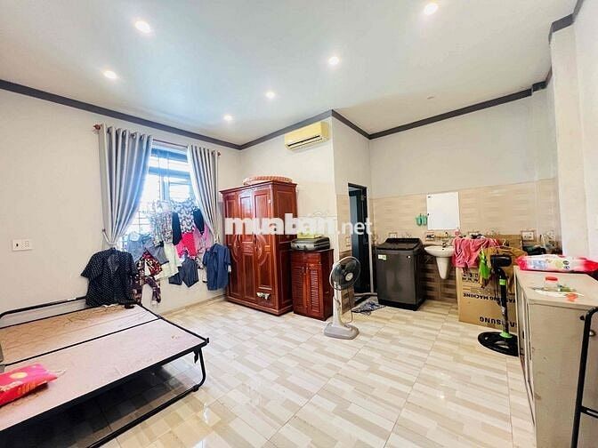 nhà 1 trệt 2 lầu mặt tiền chính kinh doanh