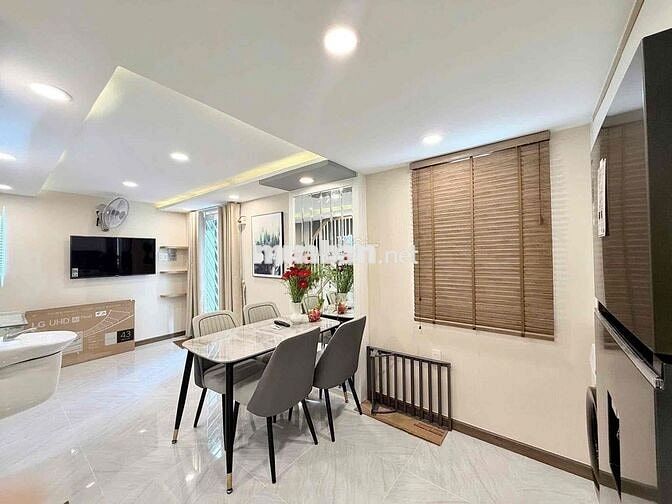 NHÀ XINH CÁCH Mặt Tiền 30m. Sát Lê văn lương . kDC HIm Lam. Trục đường
