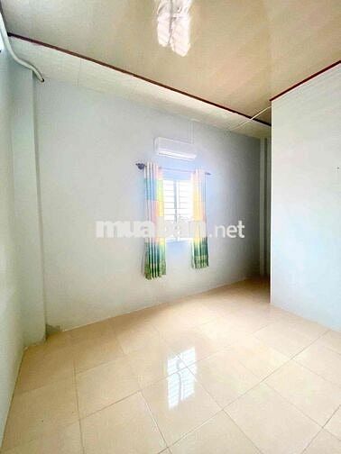 Nhà trệt lầu 4 phòng ngủ lộ oto mặt tiền đường Trần Văn Nghiêm
