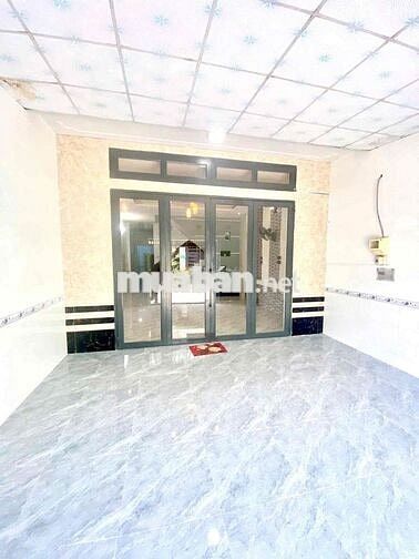 Nhà trệt lầu 4 phòng ngủ lộ oto mặt tiền đường Trần Văn Nghiêm
