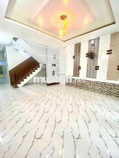 Nhà trệt lầu 4 phòng ngủ lộ oto mặt tiền đường Trần Văn Nghiêm