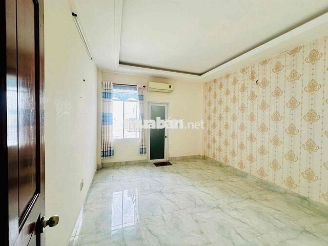 Nhà 3 lầu Lâm Thị Hố Q12 ngay trường học Việt Âu. Có garage xe.