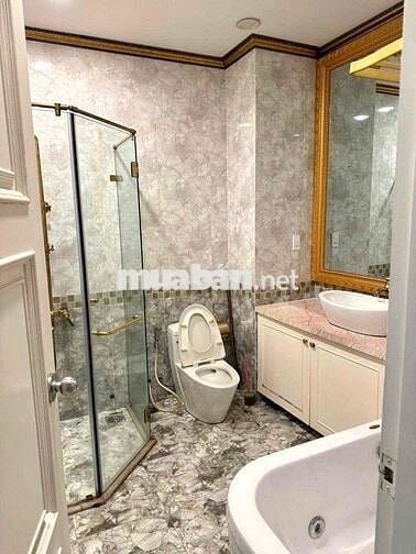 NHÀ MẶT TIỀN HUỲNH VĂN BÁNH 8PN 8WC