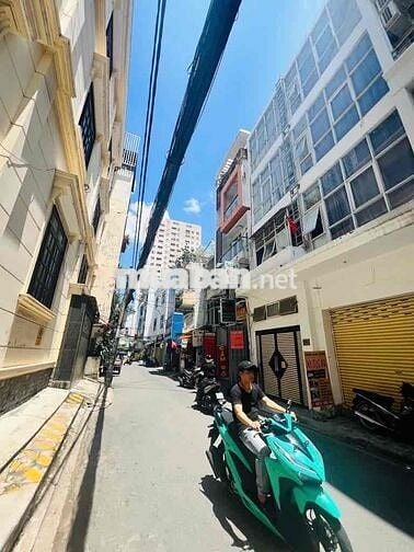 Căn hộ dịch vụ 80m2, 13PN, 12WC Mặt tiền xe hơi hẻm Nguyễn Gia Trí