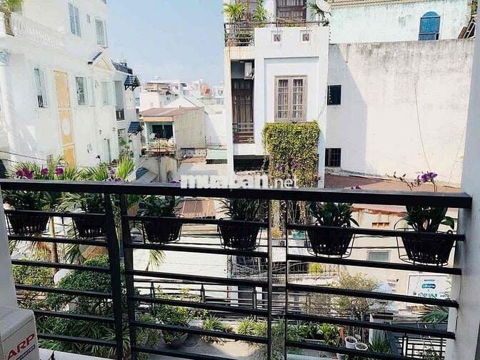 Bán nhà 5.55x18m, 2 lầu, 4pn, hẻm xe hơi thông, Trường Chinh, Q12