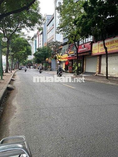 Mặt đường Nguyễn Khang . Nhà 7T x Dt 82m x Mt 5.2m.Vỉa Hè, Oto Tránh,