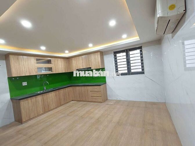 NHÀ MẶT TIỀN NGUYỄN HỮU THỌ CÓ THANG MÁY