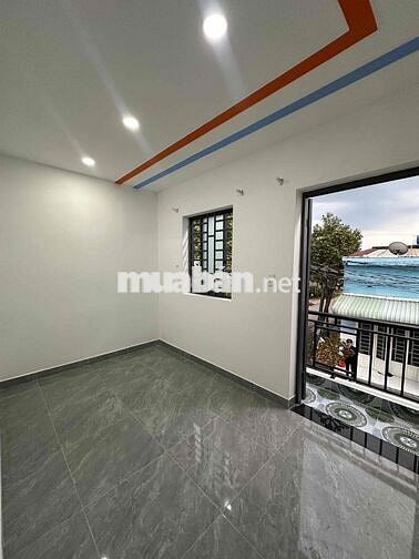 Nhà mặt tiền 1 trệt 1 lầu(4x10)Hóc Môn ngay cầu lớn giá 385 triệu.