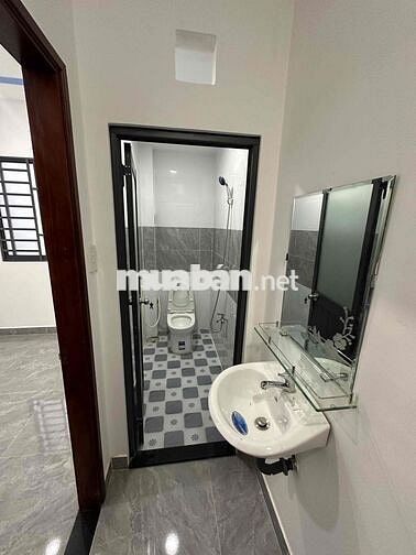 Nhà mặt tiền 1 trệt 1 lầu(4x10)Hóc Môn ngay cầu lớn giá 385 triệu.