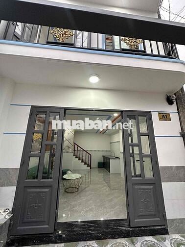 Nhà mặt tiền 1 trệt 1 lầu(4x10)Hóc Môn ngay cầu lớn giá 385 triệu.