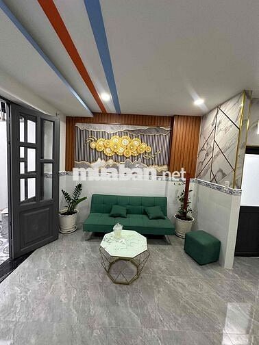 Nhà mặt tiền 1 trệt 1 lầu(4x10)Hóc Môn ngay cầu lớn giá 385 triệu.