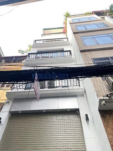 Bán nhà 7 tầng  Hào Nam- Cát Linh 55m2 Mới oto đỗ giá 22 tỷ