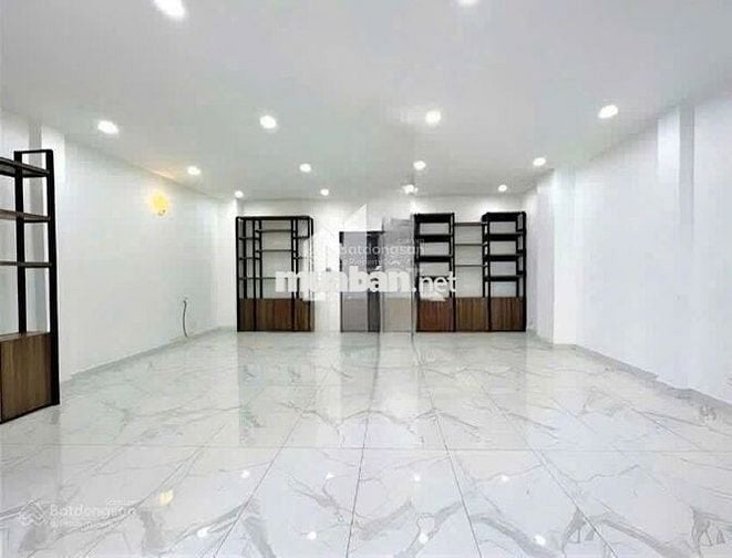 NHÀ CHO THUÊ ĐƯỜNG HUỲNH VĂN BÁNH_ TRỆT 4 LẦU_ THANG MÁY, ỐP KÍNH ĐẸP.