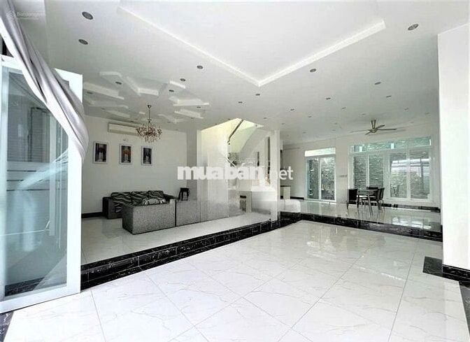 NHÀ CHO THUÊ ĐƯỜNG HUỲNH VĂN BÁNH_ TRỆT 4 LẦU_ THANG MÁY, ỐP KÍNH ĐẸP.