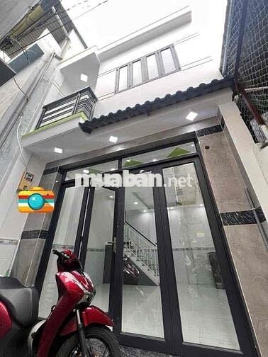 nhà đẹp 2 tầng. sát hẻm xe hơi. quận 7